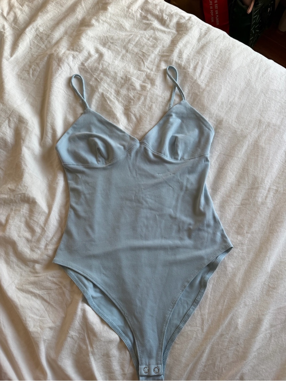Blue v-neck bodysuit